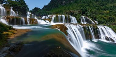 Ban Gioc - Detian waterfallBan Gioc Waterfall is the most magnificent waterfall in Vietnam, located in Dam Thuy Commune, Trung Khanh District, Cao Bang. Ban Gioc Waterfall consists of two parts, the main part of the border between Vietnam and China, clipart