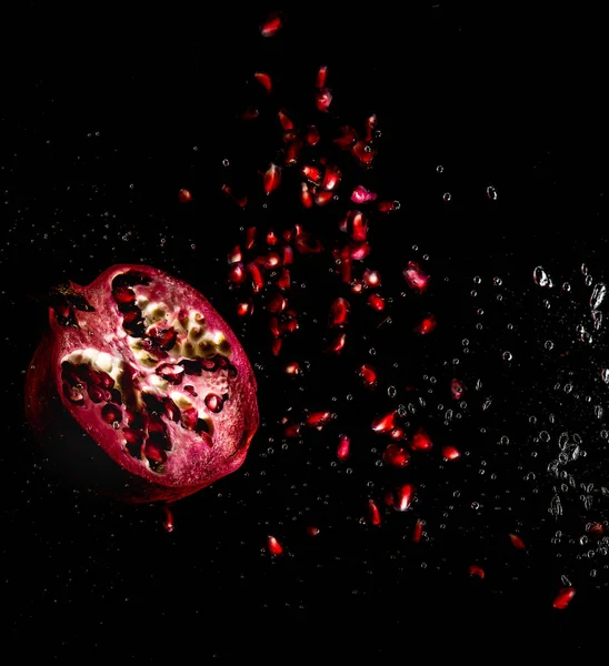Juicy Pomegranate Grains Black Background Splashes Water Air Bubbles — Stock Photo, Image
