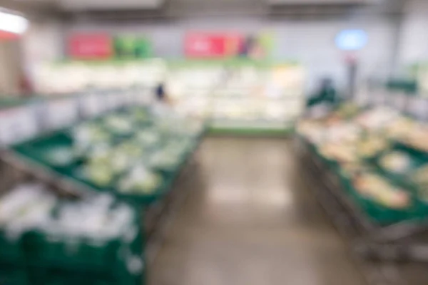 Gemüse und Obst im Supermarkt für den Hintergrund entschärft — Stockfoto