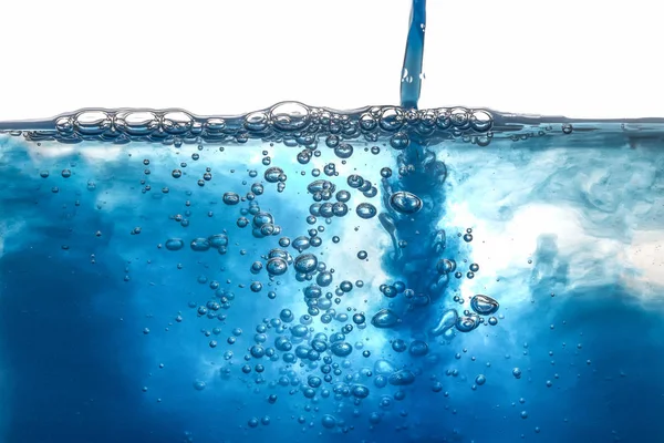 Szakadó kék buborékok a víz csobbanás, és csepp Jogdíjmentes Stock Képek