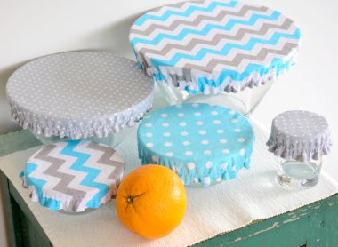 Set of bowls covered with reusable zero waste fabric cloth covers clipart