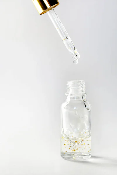 Particelle Oro Scintillante Bottiglia Siero Con Contagocce — Foto Stock