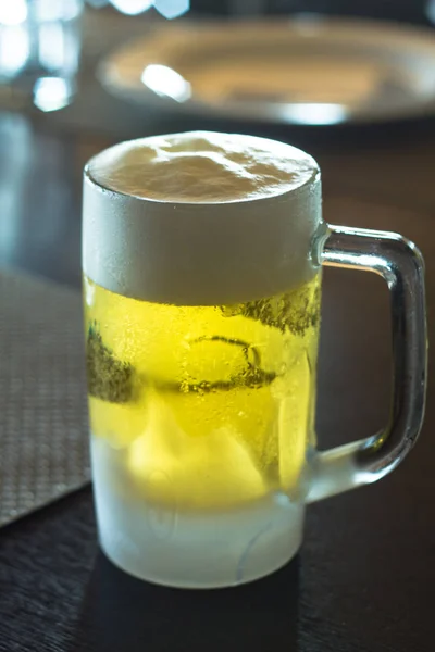 Glass of light beer — Stock Photo, Image