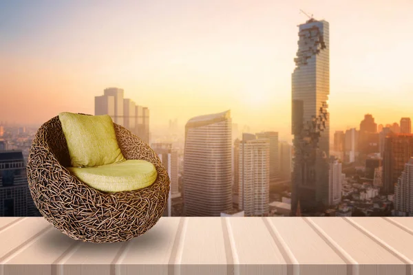 Modern Stool Chair with wood frame structure on wood floor with cityscape view of Bangkok