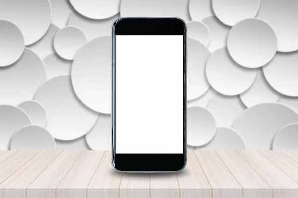 Smartphone dengan layar putih kosong dan ruang fotokopi pada tabel kayu . — Stok Foto