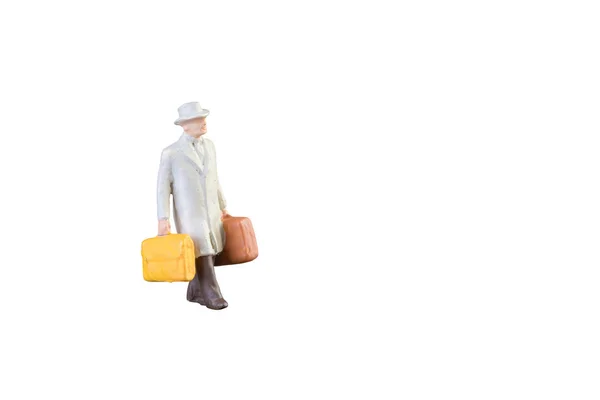 Close up van miniatuur zakenman en toeristische mensen — Stockfoto