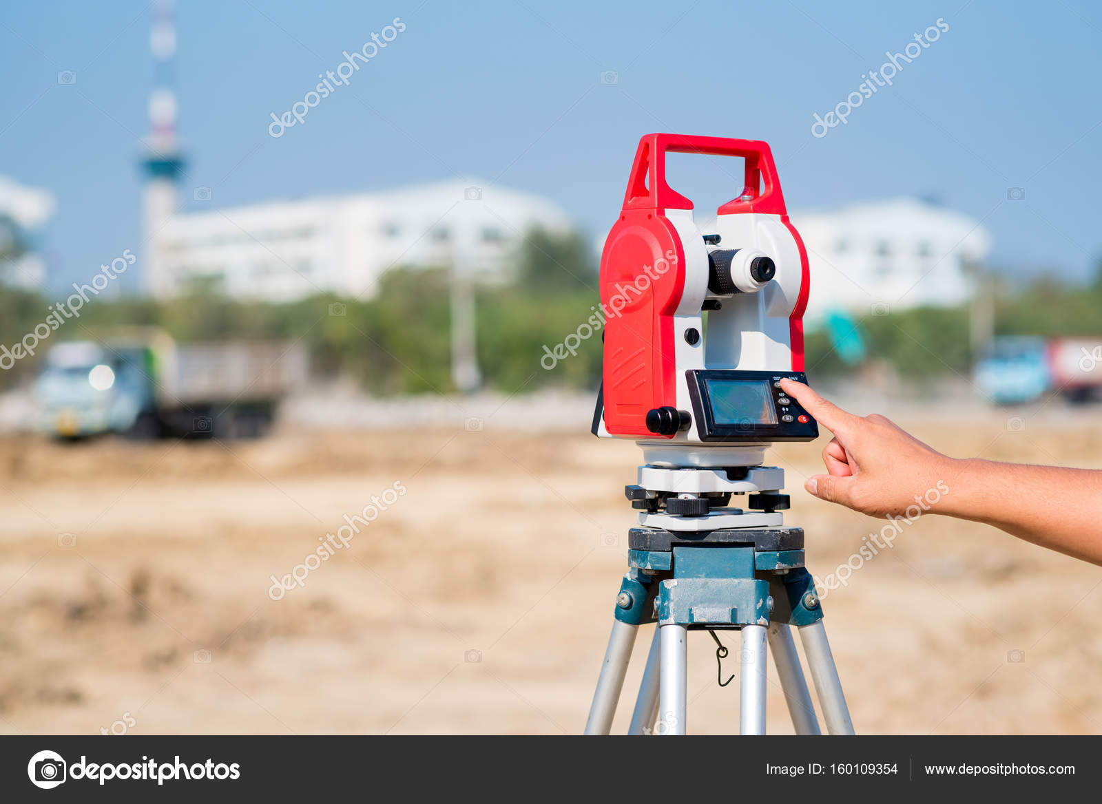Civil engineer use surveyor equipment theodolite checking