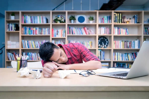 Young business entrepreneur sleeping after work stress to find out new business ideas