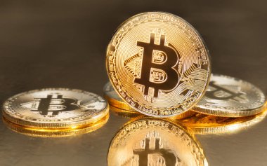 Fiziksel Bitcoins bayraklarında karlı yatırım