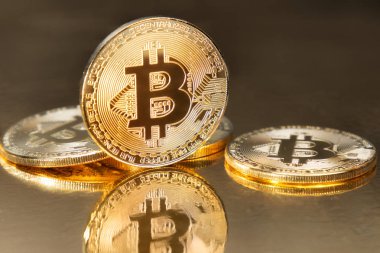 Fiziksel altın bitcoin para basma