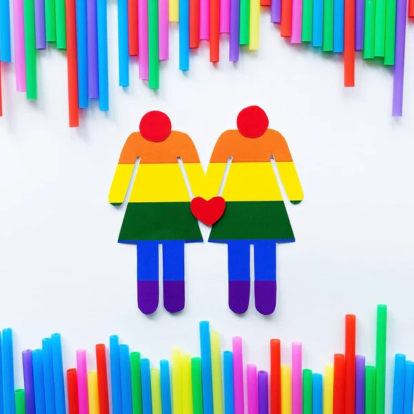 Gökkuşağı arka planında LGBT kadınlarının siluetleri