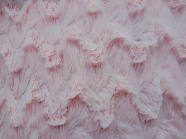 Wool fabrics. The pink wool. Wool is soft.
