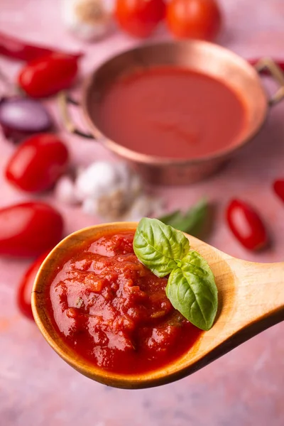 Foreground Ladle Tomato Sauce Fresh Basil Vegetable Ingredients Background — Stock Photo, Image