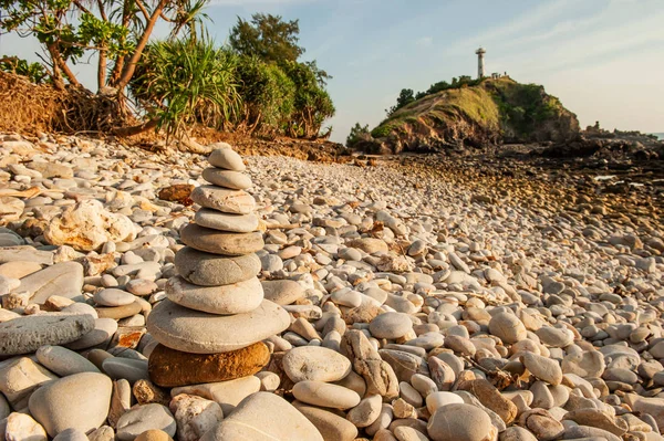 Stones balance on the stone beach.