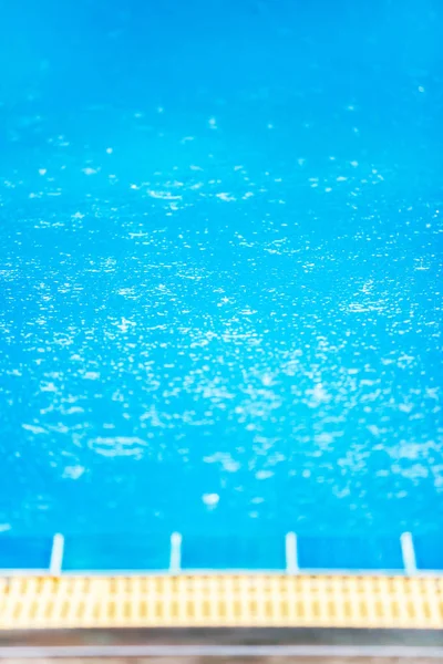 Raindrops in the blue swimming pool. — Stockfoto