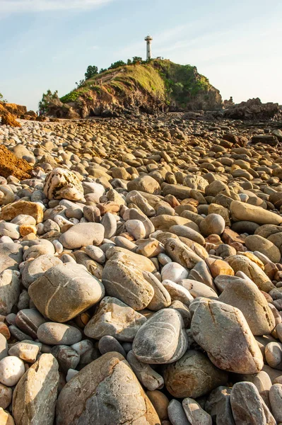 Scenery stone beach at sunset. — ストック写真