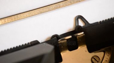 Typing the expression Fuck You !!! with an old manual typewriter