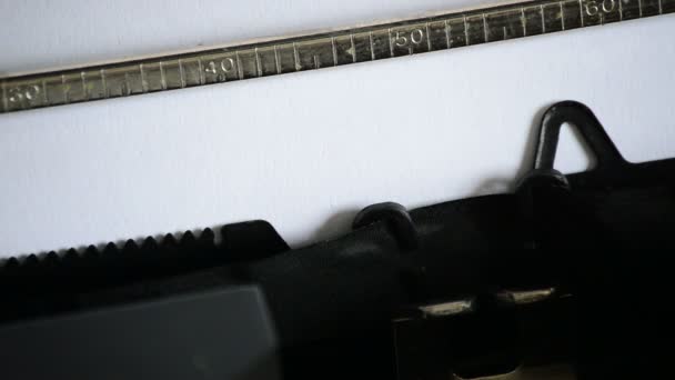 Typing the word INFORMATION with an old manual typewriter — Stock Video