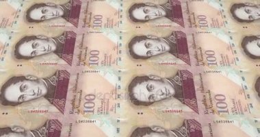 Çalışırken ekran, nakit para, döngü üzerinde yüz Venezuela bolivars banknotlar