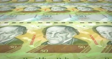 Çalışırken ekran, nakit para, döngü üzerinde elli Venezuela bolivars banknotlar