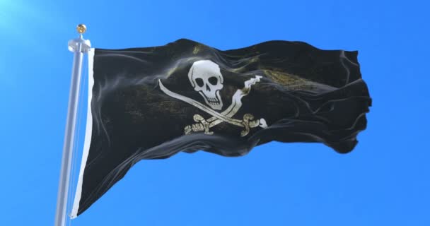 Pirate flag waving at wind in slow with blue sky, loop — Stock Video