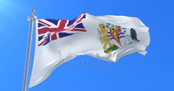 Flagge des britischen antarktischen Territoriums weht im Wind in langsamer Fahrt mit blauem Himmel, Schlaufe — Stockvideo