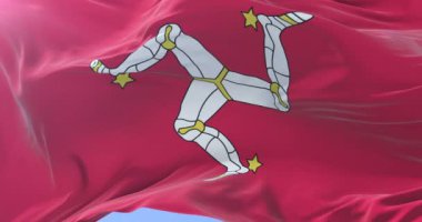 Yavaş, döngü içinde mavi gökyüzü ile Isle of Man sallayarak bayrak Rüzgar