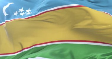 Yavaş, döngü içinde mavi gökyüzü ile Karakalpakstan sallayarak bayrak Rüzgar