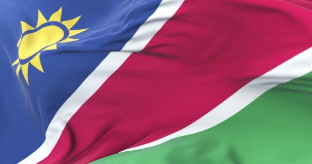 Namibië Vlag Zwaaien Wind Het Langzaam Blauwe Hemel Lus — Stockvideo