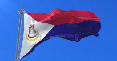 Sint Maarten yavaş mavi gökyüzü ile rüzgarda sallayarak, bayrak, döngü