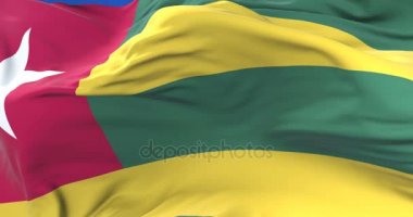 Togo yavaş mavi gökyüzü ile rüzgarda sallayarak bayrak, döngü