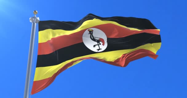 Flagga Uganda Viftande Vinden Långsamt Med Blå Himmel Slinga — Stockvideo