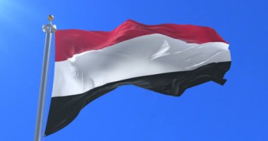 Rüzgarda, yavaş mavi gökyüzü ile sallayarak Yemen bayrak, döngü