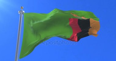 Zambiya bayrak sallayarak rüzgarda, yavaş mavi gökyüzü ile döngü