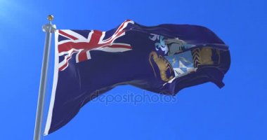 Tristan da Cunha bayrak sallayarak rüzgarda, yavaş mavi gökyüzü ile döngü