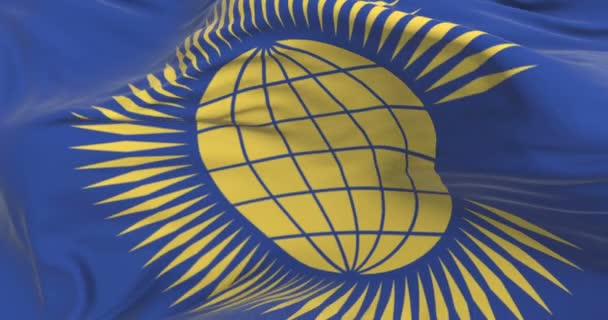 Steagul Commonwealth Nations Flutură Vânt Cerul Albastru Buclă — Videoclip de stoc