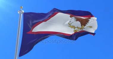 Amerikan Samoası bayrak sallayarak rüzgarda, yavaş mavi gökyüzü ile döngü