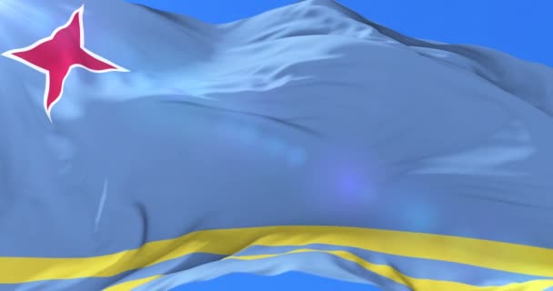 Флаг Арубы Медленно Машущий Ветром Голубым Небом Петля — стоковое видео