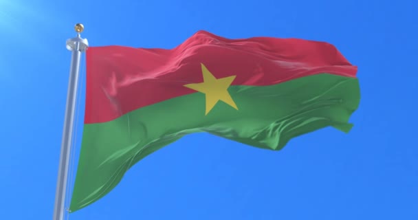 Bandera Burkina Faso Ondeando Viento Lentamente Con Cielo Azul Bucle — Vídeos de Stock