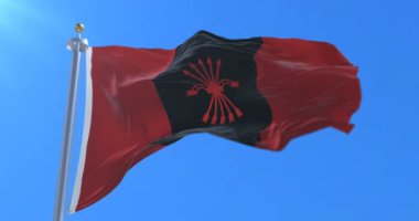 İspanyol parti Falange Espaola de la Jons, mavi gökyüzünde hareketli bayrak döngü