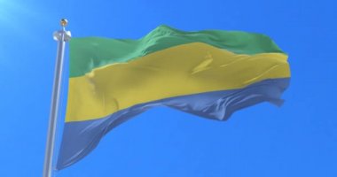 Yavaş, döngü içinde mavi gökyüzü ile Gabon sallayarak bayrak Rüzgar