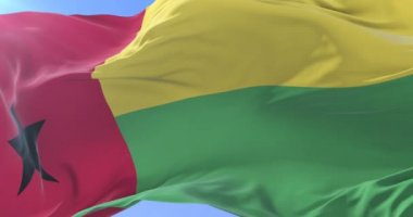 Gine Bissau rüzgarda, yavaş mavi gökyüzünde sallayarak, bayrak, döngü