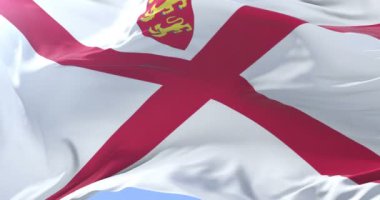 Jersey bayrağı mavi gökyüzü ile Rüzgar sallıyor, döngü