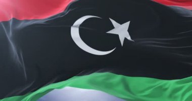 Yavaş, döngü içinde mavi gökyüzü ile Libya bayrağı sallayarak, Rüzgar