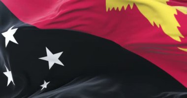 Papua Yeni Gine bayrak Rüzgar yavaş, döngü içinde mavi gökyüzü ile sallayarak