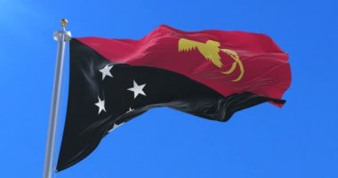 Yavaş, döngü içinde mavi gökyüzü ile Papua Yeni Gine sallayarak bayrak Rüzgar