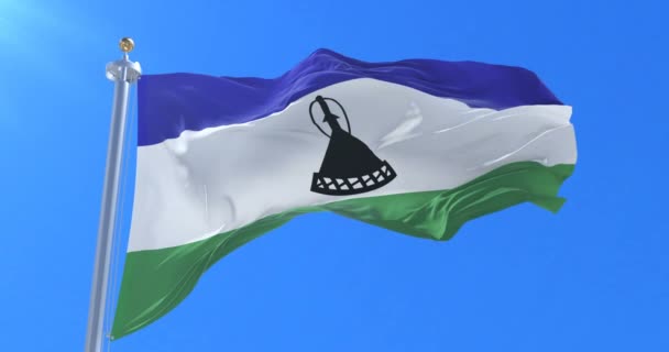 Bandeira Lesoto Acenando Vento Com Céu Azul Lento Loop — Vídeo de Stock
