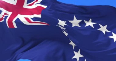 Cook Adaları bayrağı mavi gökyüzü ile Rüzgar sallıyor, döngü