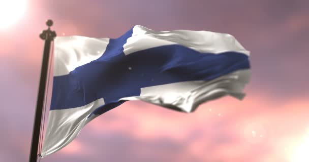 芬兰国旗挥舞着风在日落 — 图库视频影像