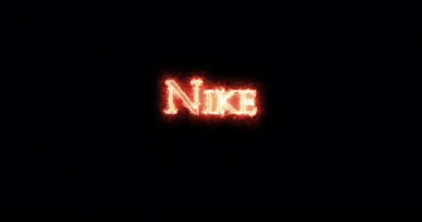 Nike Skrev Med Eld Ögla — Stockvideo